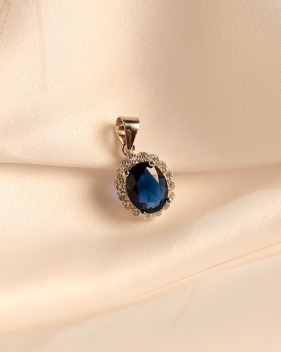 Oval Royal Blue Halo Pendant